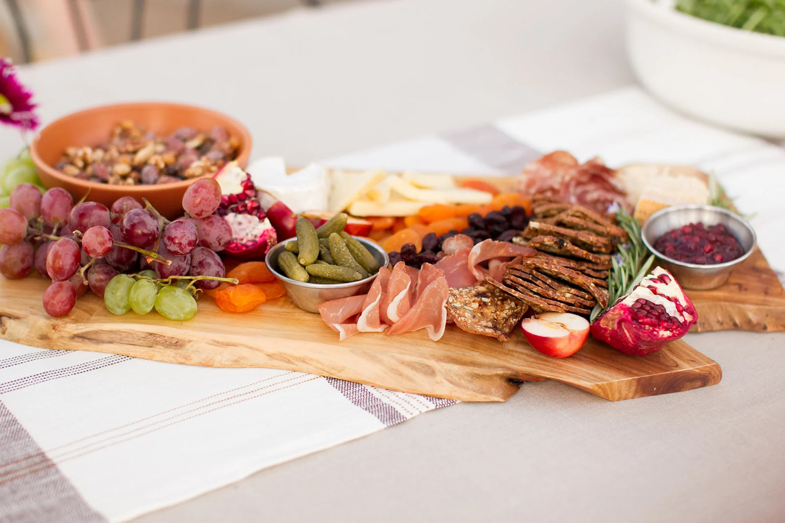 Deli board with cured meats and fruit