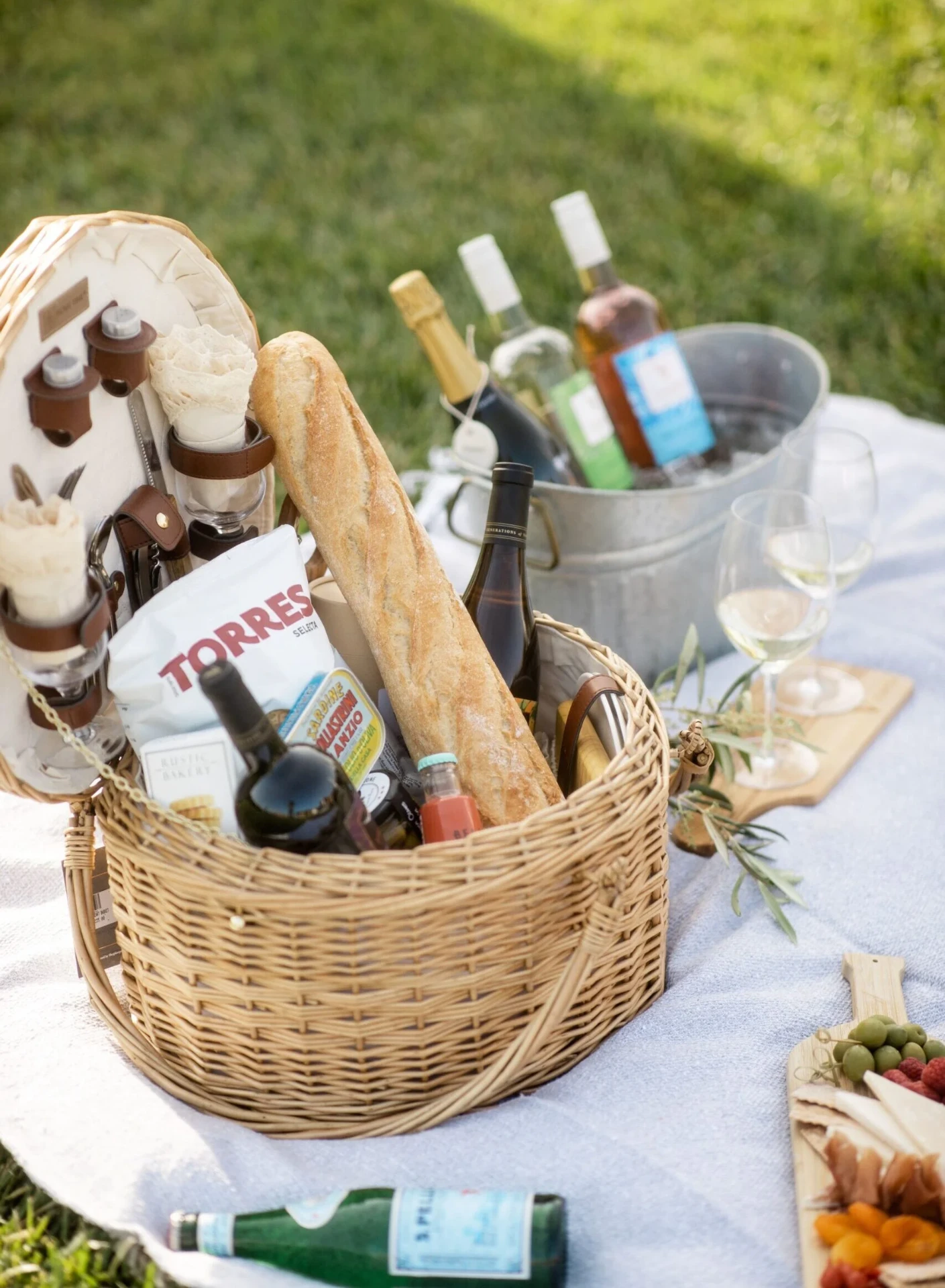 Picnic basket with wine and bread